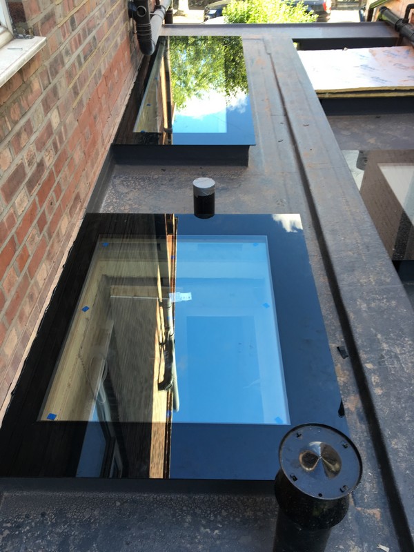 Multiple flat roof skylights on extension in Holborn